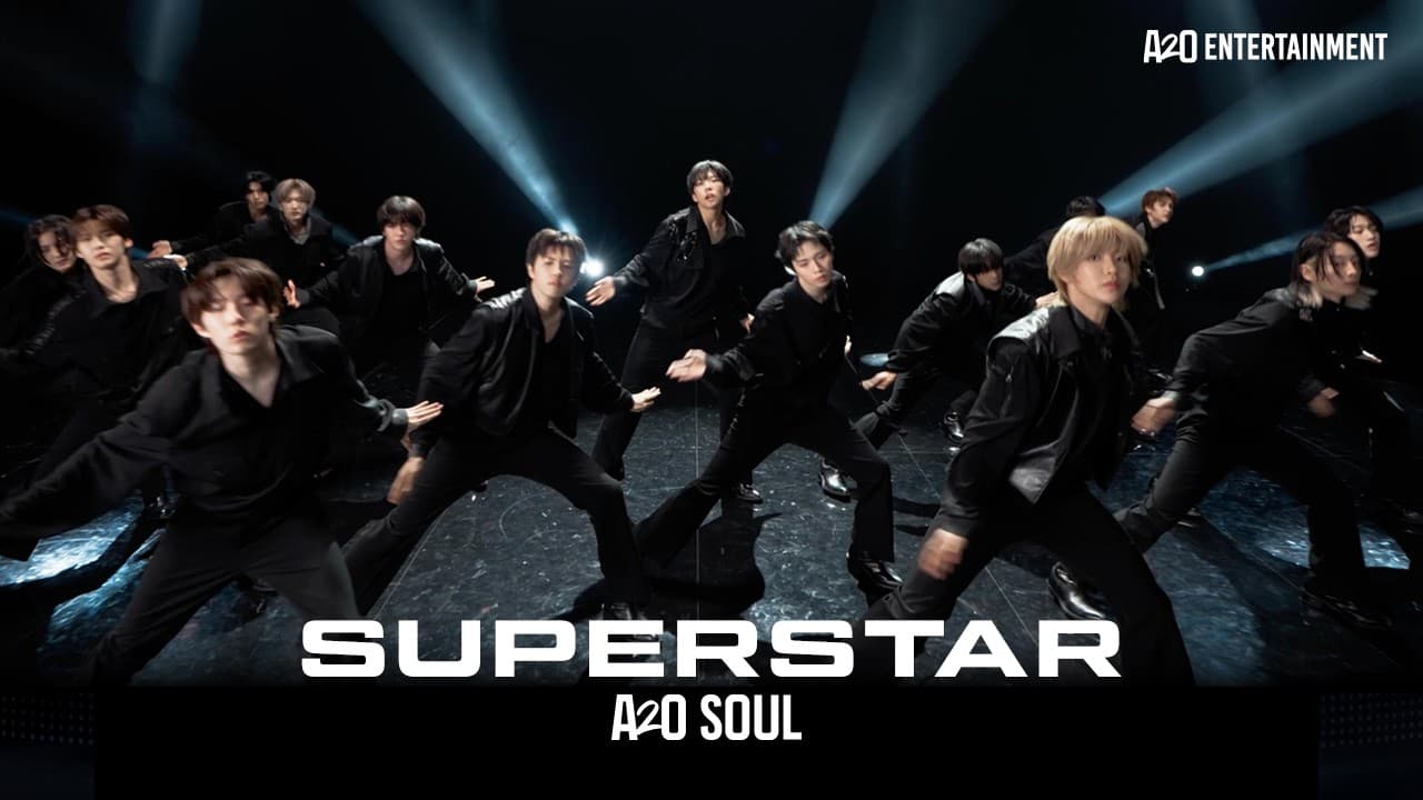 A2O SOUL's members in black shirts and leather jackets, lunging in formation under stage lights, on the thumbnail of the 'SUPERSTAR' music video