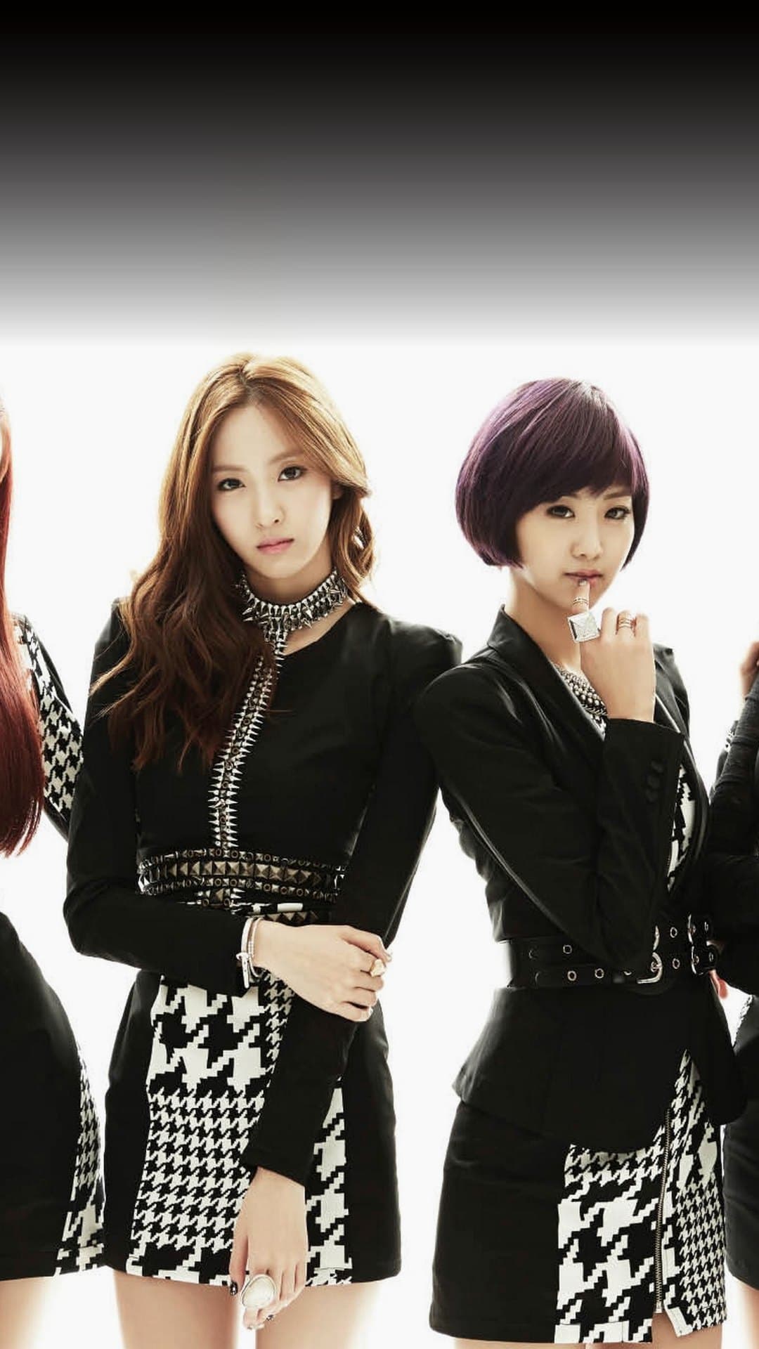 Two members of BESTie in black-and-white houndstooth dresses, one with long light-brown hair and one with a purple bob, on the cover of their 2013 single 'Love Options'